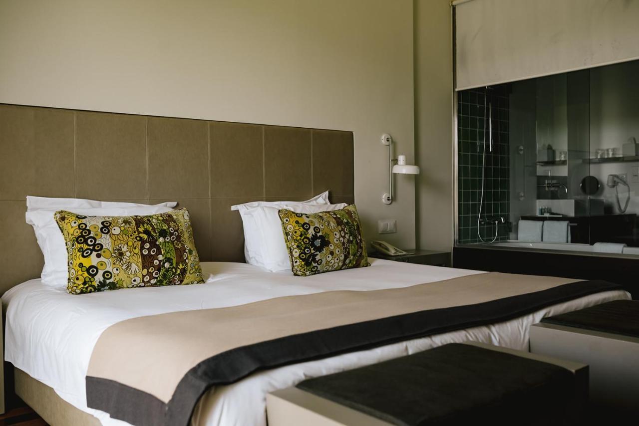 M'Ar De Ar Aqueduto Hotel Evora Exterior photo A room at the hotel