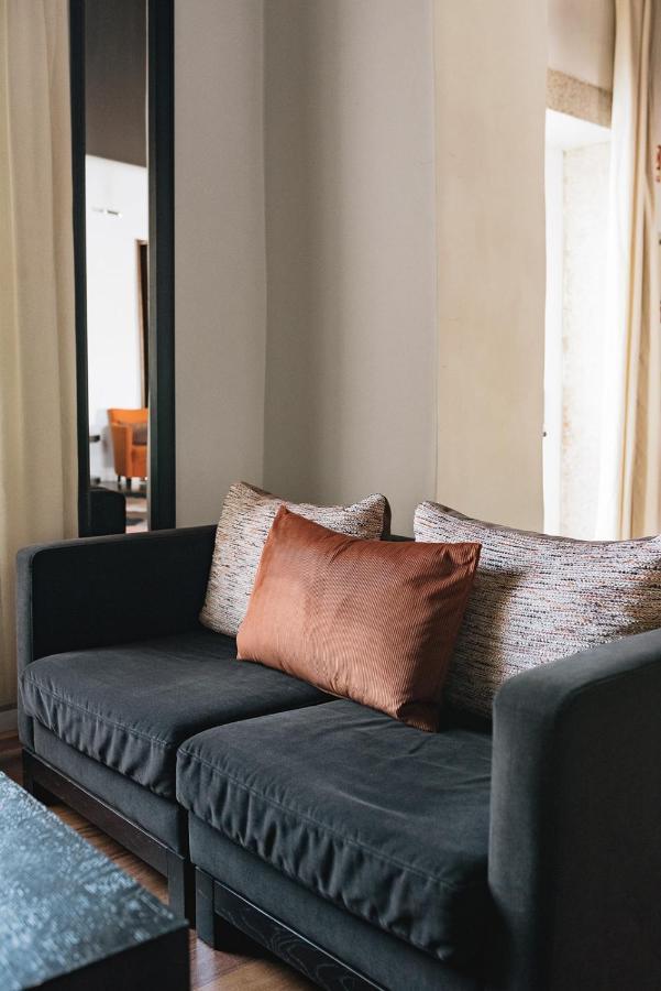M'Ar De Ar Aqueduto Hotel Evora Exterior photo A throw pillow on a sofa